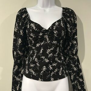 Black puff sleeve with bustier style long sleeved Anthropologie top size medium